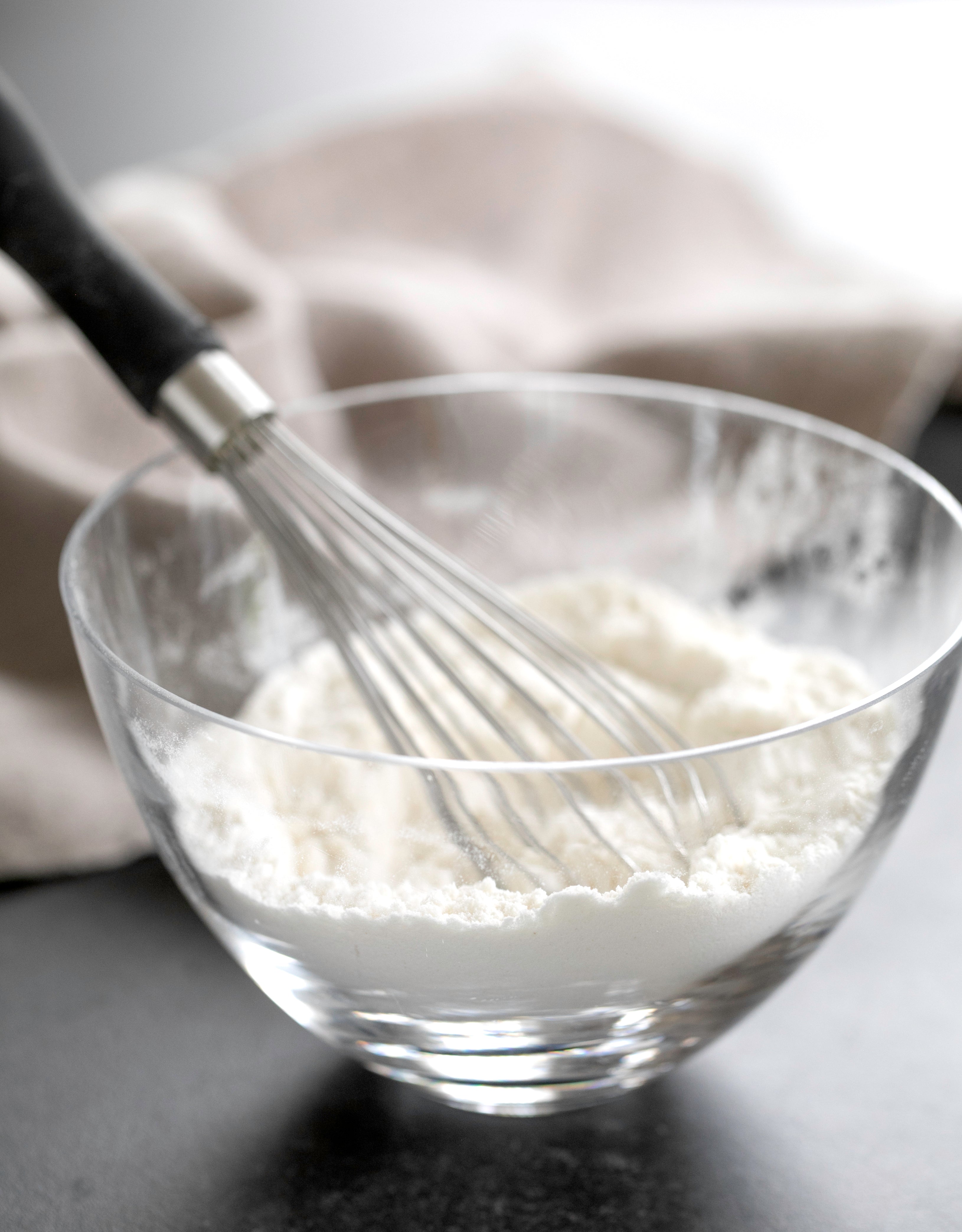 whisk of nicole's gluten free flour blend in bowl